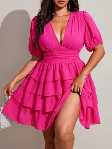 Detail of plus size hot pink V-neck tiered mini dress with short sleeves