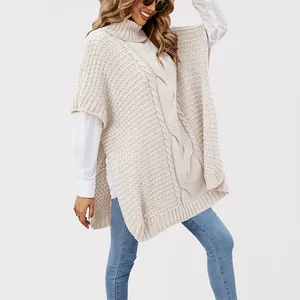 Chic women's beige high-neck cable knit poncho sweater with loose fit and side slits