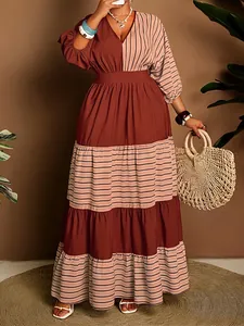 Elegant plus size striped color-block maxi dress with V-neck, tiered skirt and waist belt