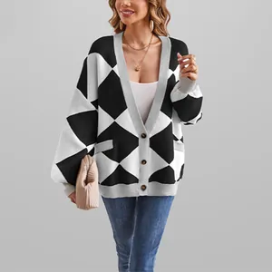 Oversized women's V-neck argyle patchwork knit cardigan sweater in black and white