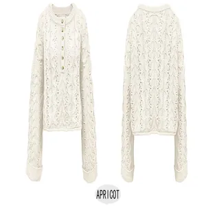 Front and back views of an apricot cable-knit pullover sweater with button neck detail