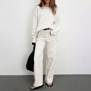 Stylish women's minimalist solid white round neck loose knit sweater for autumn