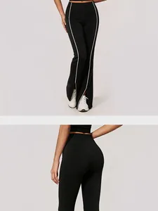 Detailansicht der schwarzen Schlag-Yogahose mit Seitenstreifen und Schlitz am Saum.