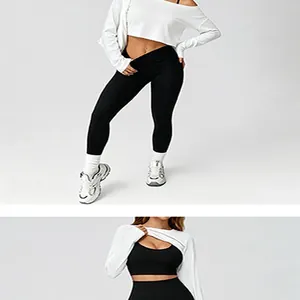Detailansicht eines nahtlosen 3-teiligen Yoga-Sets mit weißem Bolero und schwarzen Leggings.