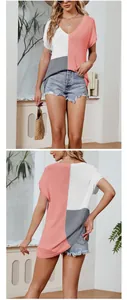 Professional front and back view of a loose V-neck color-block knit top for women.
