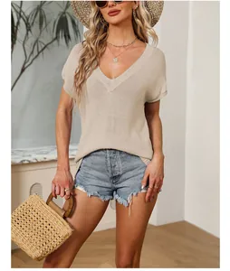 Detailed view of beige V-neck knit sweater with loose short sleeves for summer