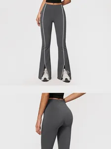 Detailansicht der grauen Schlaghose für Damen mit hoher Taille und weißen Seitenstreifen.