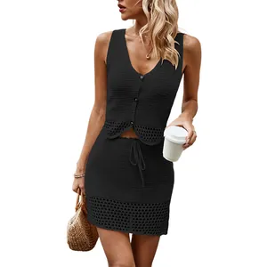 Chic black two-piece knit set featuring a V-neck sleeveless vest and mini skirt