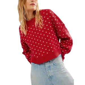 Red crewneck knit sweater with white butterfly jacquard pattern in loose crop fit