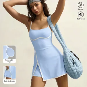 Detail view of light blue tennis dress with built-in shorts and removable cups