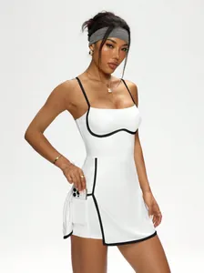 White tennis dress with contrast lines and side pocket detail for tennis.