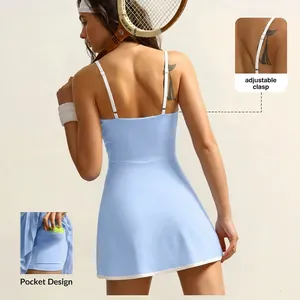 Back detail of blue tennis dress showing adjustable straps and built-in ball pocket.