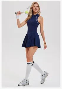 Navy pleated tennis dress set for women with half-zip collar and athletic styling