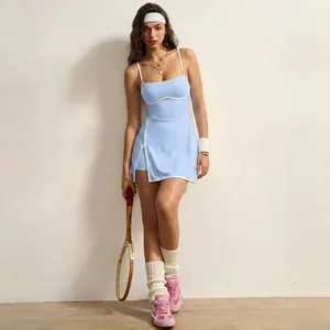 Light blue tennis dress detail with contrast piping and built-in padded bra pads.