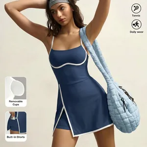 Athletic blue tennis dress with white contrast piping, built-in shorts and removable cups