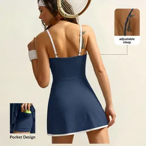Back view of navy tennis dress featuring adjustable straps and a side pocket detail.