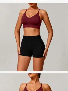 Professional seamless maroon sports bra and black yoga shorts fitness set for women