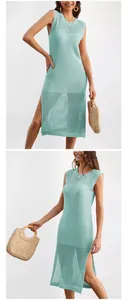 Detailed view of chic mint green sleeveless knit dress with hollow-out mesh and side slit