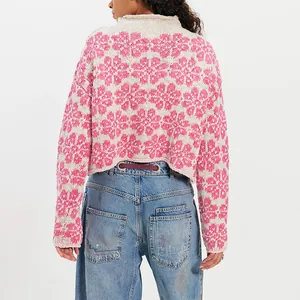 Casual loose knit sweater with pink floral jacquard pattern and a round neck design