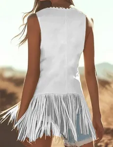 Back view of a chic white fringe vest for women showing bohemian style details outdoors