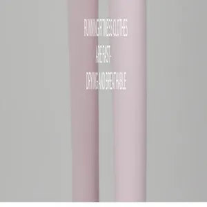 Close-up of breathable and fast-drying pink fabric used for yoga fitness clothes