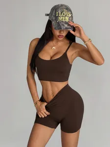 Model wearing brown seamless yoga set and camo hat, highlighting the athletic fit.