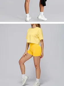 Ensemble de yoga jaune sans couture pour femme avec crop top et short de sport