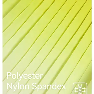 Close-up of lime green gradient pleated fabric for a breathable sports tennis skirt.
