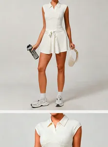 Detailed view of a white women's tennis dress with a collared neck and tie-waist