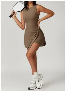 Professional detail view of a brown athletic wrap dress for tennis and yoga workouts
