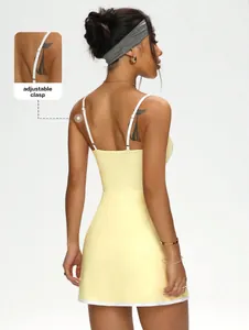 Back view of yellow tennis dress featuring adjustable straps and A-line hem