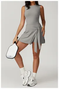 Detailed shot of grey tie-waist tennis dress for professional fitness and yoga