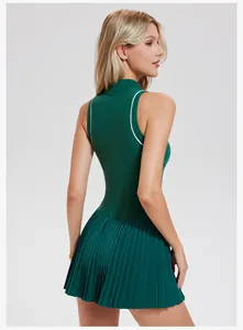 Professional back view of a sleeveless dark green pleated tennis dress for athletic wear