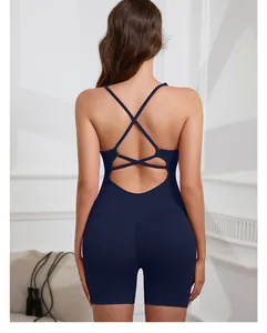 Vue arrière détaillée d'une combinaison de yoga bleu marine à bretelles croisées