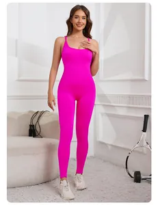 Bright pink seamless athletic jumpsuit for women featuring cross back straps and long pants