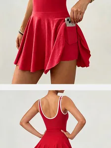 Detail of a red athletic tennis dress featuring side pocket and white trim back design