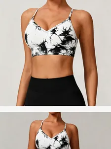 Close-up of seamless yoga bra featuring a stylish black and white ink splash pattern
