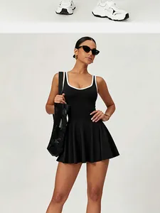 Detail of black pleated tennis dress with built-in chest pads and breathable fabric