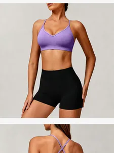Detail showing purple seamless yoga bra with stylish cross-strap back design for fitness.