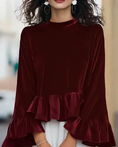 Elegant wine-red velvet blouse featuring a stylish ruffle hem and high neckline details