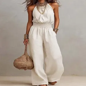 Elegant sleeveless linen jumpsuit featuring a backless design and wide-leg style