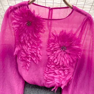Elegant magenta sheer chiffon blouse with large 3D floral appliqués and lantern sleeves.
