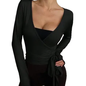 Breathable black wrap yoga top for women with long sleeves and adjustable waist tie