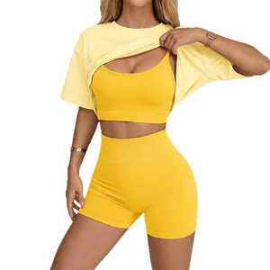 Ensemble de yoga jaune sans couture 3 pièces avec t-shirt, brassière et short