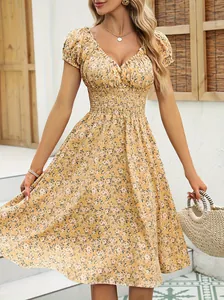 Elegant detailed view of a retro floral puff sleeve French V-neck dress for women.