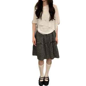 Elegant Korean style summer outfit featuring white 5-sleeve knit top and floral midi skirt