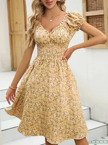 Charming French style floral dress with vintage puff sleeves and an elegant V-neckline