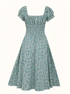 Vintage light blue floral puff sleeve dress with a smocked waist and elegant French style