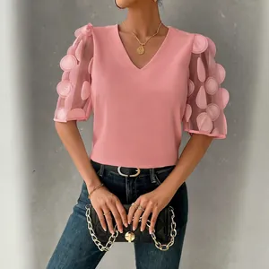 Elegant pink V-neck blouse featuring unique 3D polka dot mesh bubble sleeves for summer
