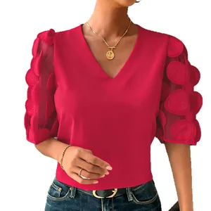 Elegant red V-neck summer blouse featuring 3D cutout puff sleeves and sheer mesh detailing